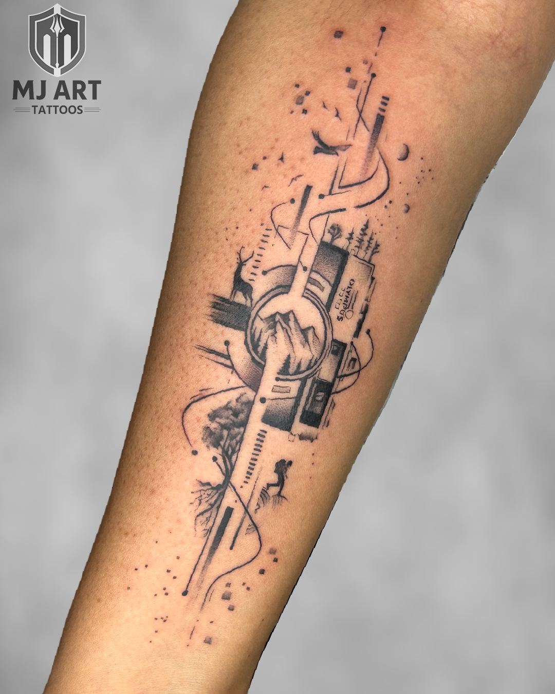 Abstract Travel Theme Forearm Tattoo